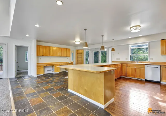Photo 3 of Single family home for sale at 7050 E 99th Avenue, Anchorage, AK 99507 | MLS# 26-11769 | Listing updated on 2026-10-08