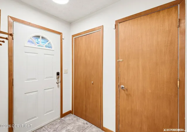 Photo 3 of Sale Pending at 7300 Clairborne Dr, Anchorage, AK 99502 | MLS# 26-11912 | Listing updated on 2026-09-21