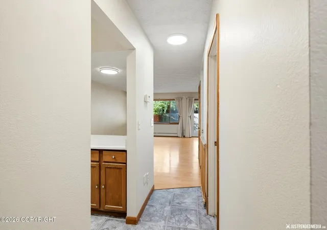 Photo 3 of Sale Pending at 7300 Clairborne Dr, Anchorage, AK 99502 | MLS# 26-11912 | Listing updated on 2026-09-21