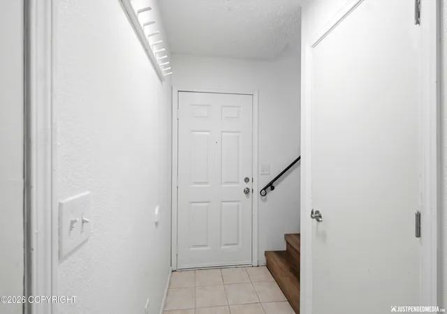 Photo 3 of Single family home for sale at 1130 W 71st Court, Anchorage, AK 99518 | MLS# 26-11654 | Listing updated on 2026-10-31