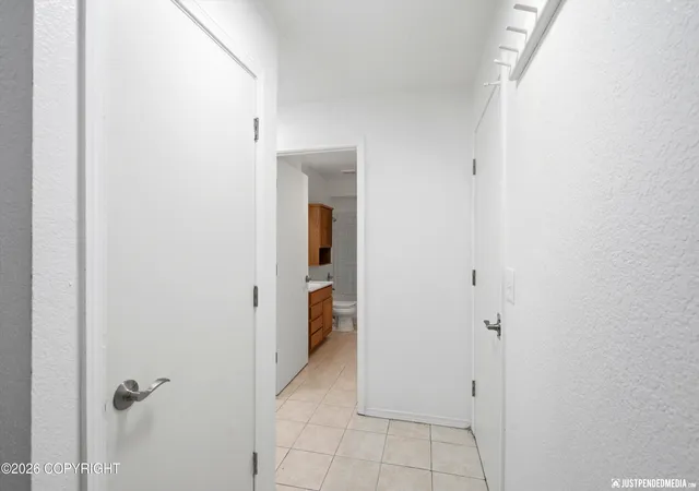 Photo 4 of Single family home for sale at 1130 W 71st Court, Anchorage, AK 99518 | MLS# 26-11654 | Listing updated on 2026-10-31