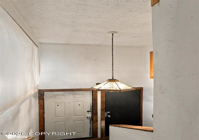 Photo 2 of Multi family home for sale at 733 Price St, Anchorage, AK 99508 | MLS# 26-11689 | Listing updated on 2026-10-07