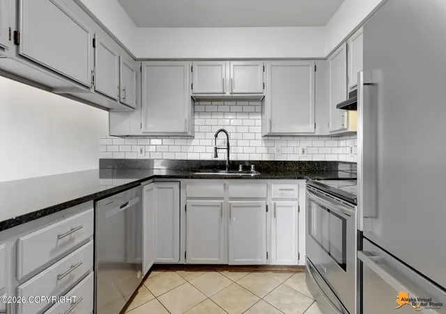 Photo 4 of Single family home for sale at 1009 Fred Cir, Anchorage, AK 99515 | MLS# 26-11721 | Listing updated on 2026-09-14
