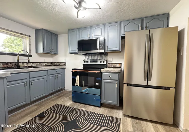 Photo 3 of Single family home for sale at 115 S Montgomery Way, Palmer, AK 99645 | MLS# 26-11929 | Listing updated on 2026-10-14