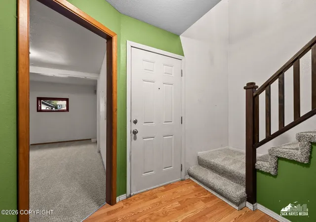 Photo 2 of Sale Pending at 9080 Ashley Cir, Anchorage, AK 99502 | MLS# 26-11897 | Listing updated on 2026-10-09