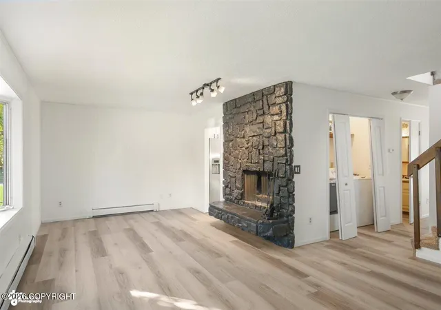 Photo 3 of Sale Pending at 2001 Blue Grass Cir, Anchorage, AK 99502 | MLS# 26-12774 | Listing updated on 2026-10-08
