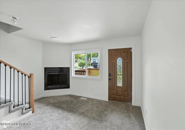 Photo 3 of Single family home for sale at 7071 Baxter Ter Cir, Anchorage, AK 99504 | MLS# 26-12111 | Listing updated on 2026-09-21