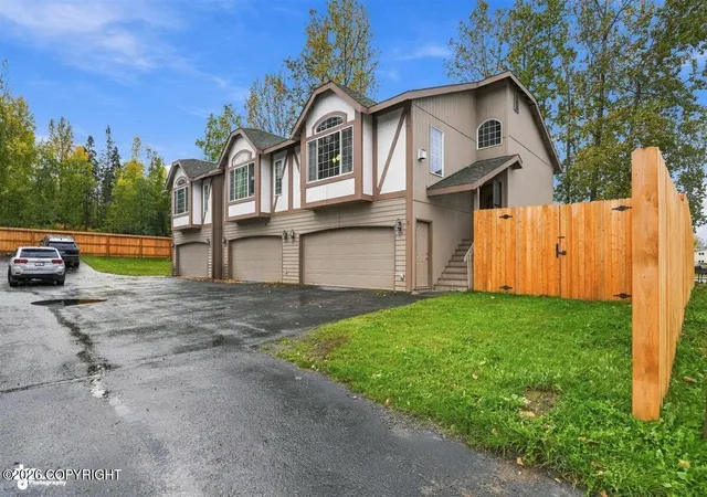 Photo 2 of Condo for sale at 3101 E Tudor Rd #C, Anchorage, AK 99507 | MLS# 26-12233 | Listing updated on 2026-09-24