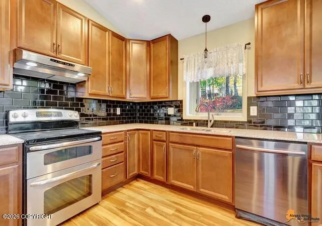 Photo 2 of Sale Pending at 2431 Chandalar Dr, Anchorage, AK 99504 | MLS# 26-12546 | Listing updated on 2026-10-02