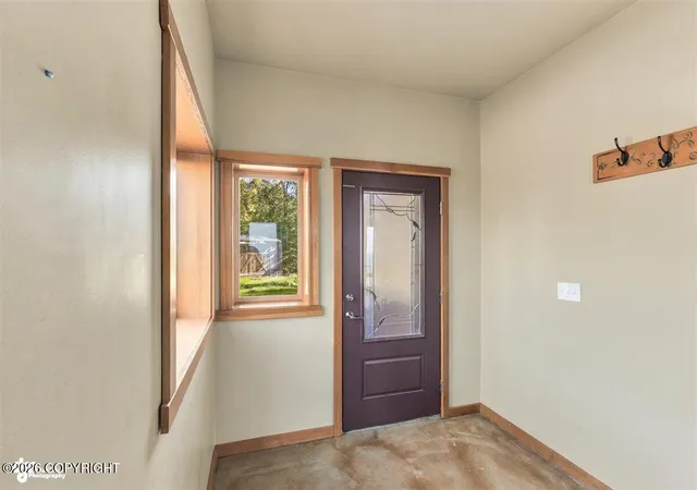 Photo 3 of Single family home for sale at 18700 England Cir, Anchorage, AK 99516 | MLS# 26-12374 | Listing updated on 2026-09-25