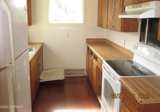 Photo 3 of Sale Pending at 4210 E 3rd Avenue, Anchorage, AK 99508 | MLS# 26-12494 | Listing updated on 2026-10-21