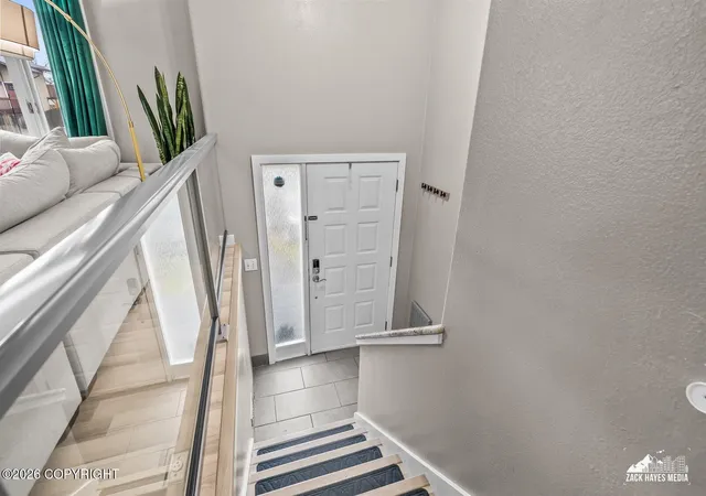 Photo 2 of Single family home for sale at 8013 Parkridge Cir, Anchorage, AK 99507 | MLS# 26-12869 | Listing updated on 2026-10-08