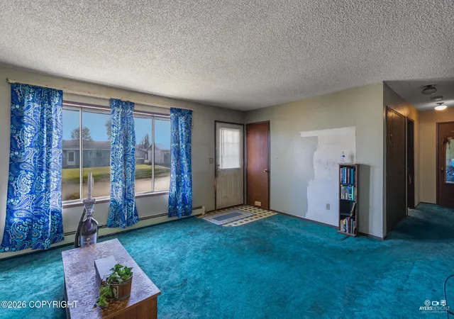 Photo 3 of Single family home for sale at 697 Sycamore Cir, Kenai, AK 99611 | MLS# 26-12602 | Listing updated on 2026-10-10