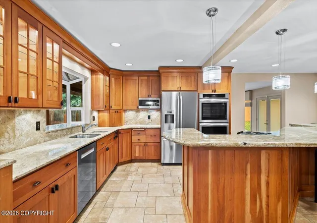 Photo 2 of Single family home for sale at 2084 Arlington Dr, Anchorage, AK 99517 | MLS# 26-12662 | Listing updated on 2026-10-16