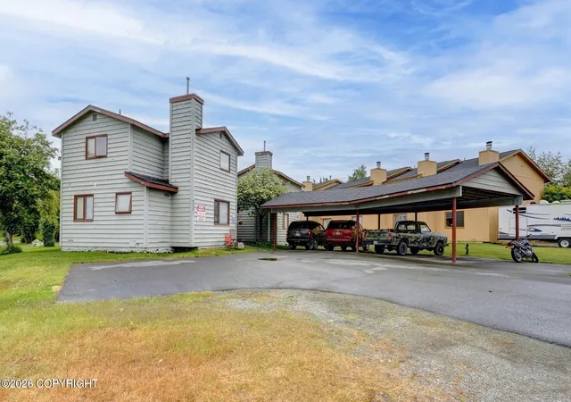 Photo 1 of Multi family home for sale at 7301 Woburn Cir, Anchorage, AK 99502 | MLS# 26-12877 | Listing updated on 2026-10-16