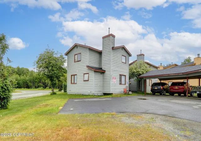 Photo 3 of Multi family home for sale at 7301 Woburn Cir, Anchorage, AK 99502 | MLS# 26-12877 | Listing updated on 2026-10-16