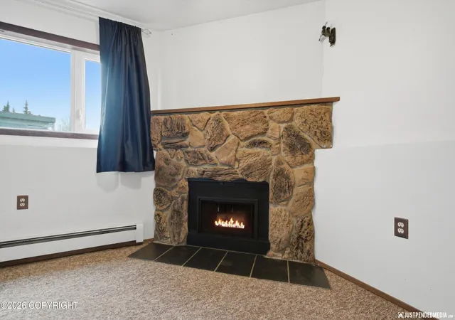 Photo 3 of Condo for sale at 231 Mccarrey St #1, Anchorage, AK 99508 | MLS# 26-12856 | Listing updated on 2026-10-08