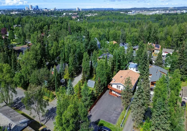 Photo 2 of Multi family home for sale at 1819 Rogers Park Ct, Anchorage, AK 99508 | MLS# 26-12835 | Listing updated on 2026-10-11