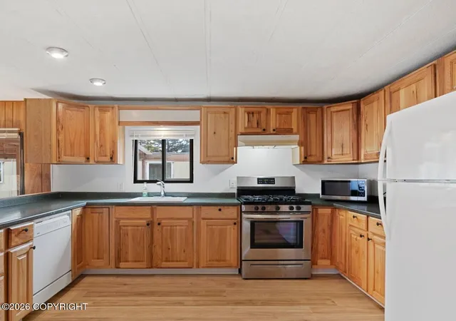 Photo 3 of Manufactured home for sale at 1200 W Dimond Blvd #1304, Anchorage, AK 99515 | MLS# 26-12970 | Listing updated on 2026-10-14
