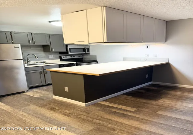 Photo 3 of Condo for sale at 2210 Sentry Dr #B-12, Anchorage, AK 99507 | MLS# 26-13084 | Listing updated on 2026-10-15