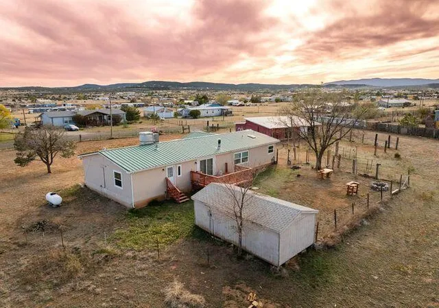 Photo 2 of Manufactured home for sale at 51 Peaceful Dr, Edgewood, NM 87015 | MLS# 1102158 | Listing updated on 2026-09-11