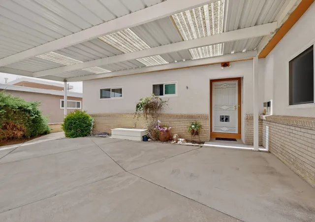 Photo 3 of Single family home for sale at 1405 Tomasita St Ne, Albuquerque, NM 87112 | MLS# 1103094 | Listing updated on 2026-09-18