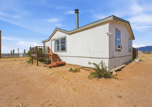 Photo 1 of Sale Pending at 8 Lavanda Ln, Los Lunas, NM 87031 | MLS# 1104623 | Listing updated on 2026-09-08