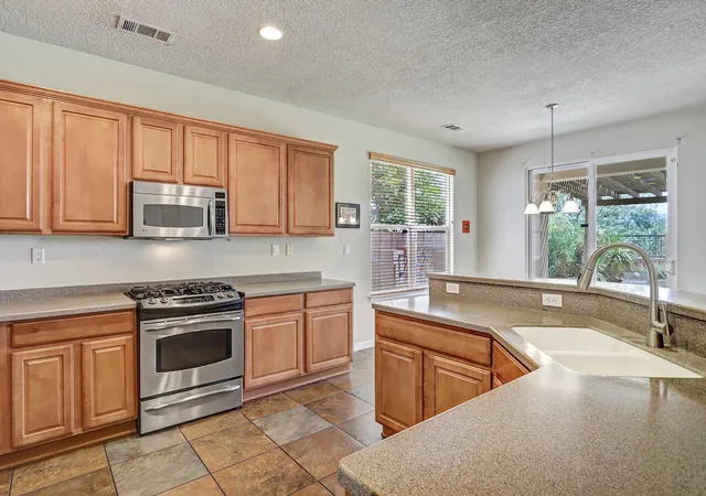 Photo 3 of Single family home for sale at 10216 Avenida Vista Sol Nw, Albuquerque, NM 87114 | MLS# 1105023 | Listing updated on 2026-10-02