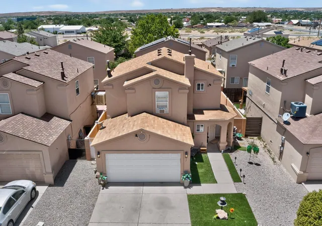 Photo 3 of Sale Pending at 1027 Cassandra St Sw, Albuquerque, NM 87121 | MLS# 1105918 | Listing updated on 2026-09-04