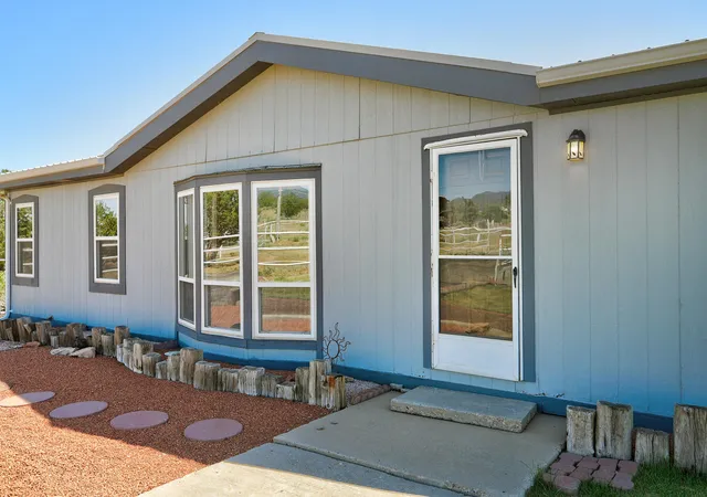 Photo 2 of Manufactured home for sale at 16 Stagecoach Jct Rd, Sandia Park, NM 87047 | MLS# 1106585 | Listing updated on 2026-10-01