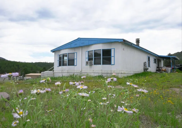 Photo 1 of Manufactured home for sale at 20 Needle Pl, Jemez Springs, NM 87025 | MLS# 1106807 | Listing updated on 2026-09-09