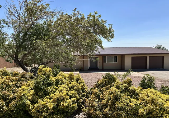 Photo 2 of Single family home for sale at 14304 Oakwood Pl Ne, Albuquerque, NM 87123 | MLS# 1106859 | Listing updated on 2026-10-06