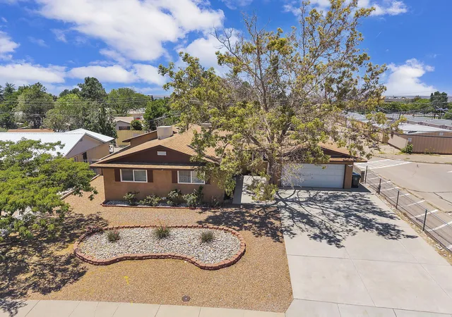 Photo 3 of Single family home for sale at 5909 Woodford Dr Ne, Albuquerque, NM 87110 | MLS# 1106915 | Listing updated on 2026-09-09