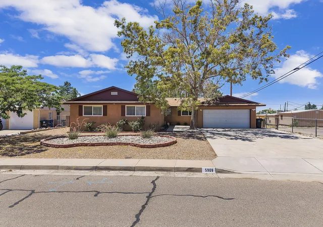 Photo 3 of Single family home for sale at 5909 Woodford Dr NE, Albuquerque, NM 87110 | MLS# 1106915 | Listing updated on 2026-09-09