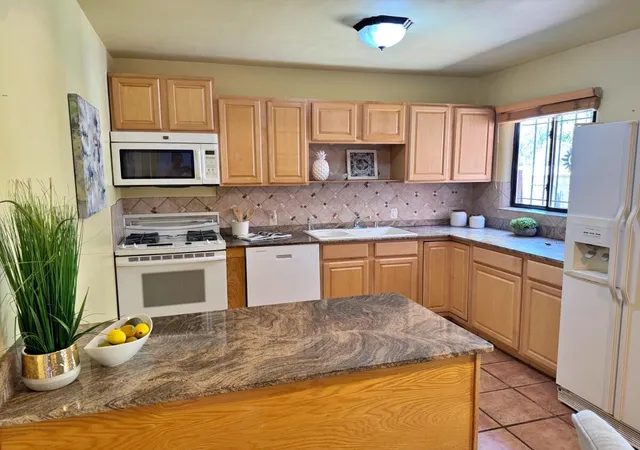 Photo 3 of Sale Pending at 1937 Truman St NE, Albuquerque, NM 87110 | MLS# 1107505 | Listing updated on 2026-09-13