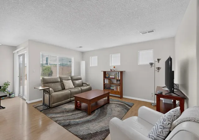 Photo 3 of Sale Pending at 348 Pequin Trl SE, Albuquerque, NM 87123 | MLS# 1107530 | Listing updated on 2026-09-03