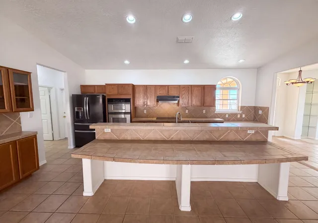 Photo 2 of Single family home for sale at 9809 Buckeye St Nw, Albuquerque, NM 87114 | MLS# 1107571 | Listing updated on 2026-09-10