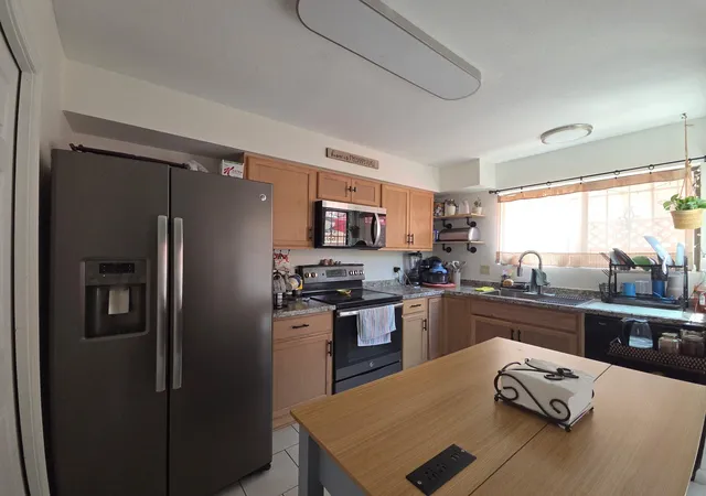 Photo 3 of Sale Pending at 10253 Las Casitas Ct Ne, Albuquerque, NM 87111 | MLS# 1107685 | Listing updated on 2026-08-31