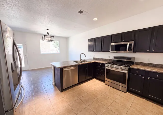 Photo 2 of Townhouse for sale at 1928 Cortina Loop Se, Rio Rancho, NM 87124 | MLS# 1108800 | Listing updated on 2026-09-03