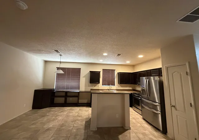 Photo 3 of Single family home for sale at 11823 Blue Ribbon Rd SE, Albuquerque, NM 87123 | MLS# 1108910 | Listing updated on 2026-09-12