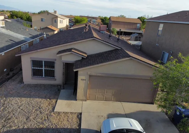 Photo 2 of Single family home for sale at 11204 Ibis Rd Sw, Albuquerque, NM 87121 | MLS# 1109021 | Listing updated on 2026-09-02