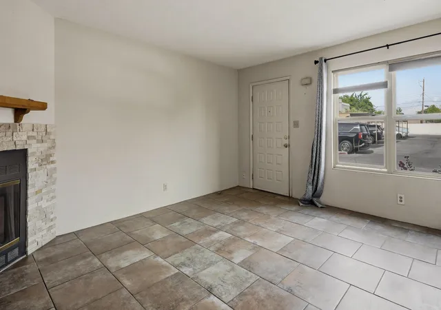 Photo 2 of Townhouse for sale at 3301 Monroe St Ne #UNIT J105, Albuquerque, NM 87110 | MLS# 1109030 | Listing updated on 2026-09-08