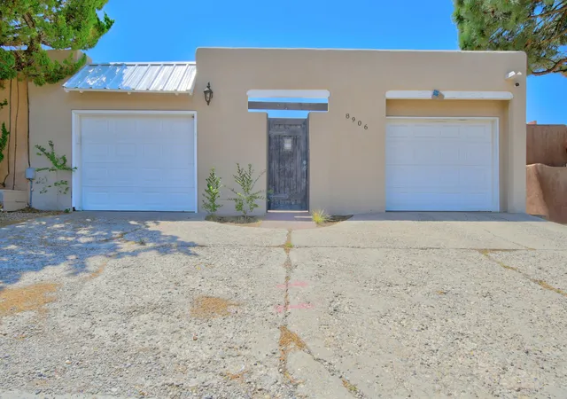 Townhouse for sale at 8906 Spain Rd NE, Albuquerque, NM 87111 | MLS# 1109234