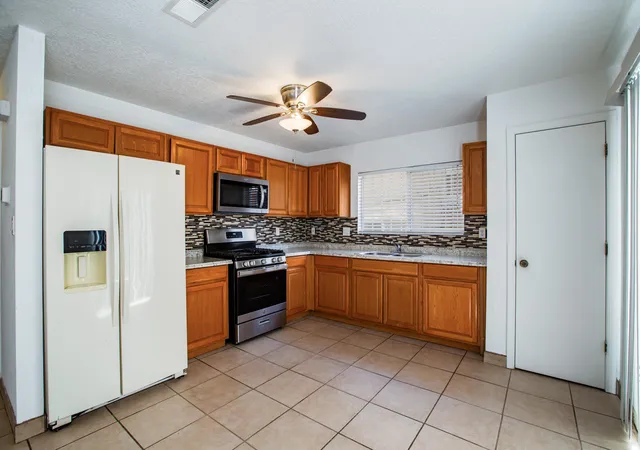 Photo 2 of Single family home for sale at 1335 Ojo Sarco St Sw, Albuquerque, NM 87121 | MLS# 1109394 | Listing updated on 2026-09-04