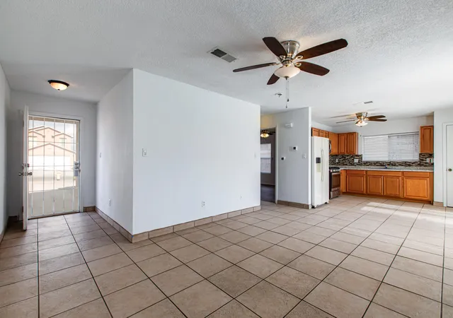 Photo 3 of Single family home for sale at 1335 Ojo Sarco St Sw, Albuquerque, NM 87121 | MLS# 1109394 | Listing updated on 2026-09-04