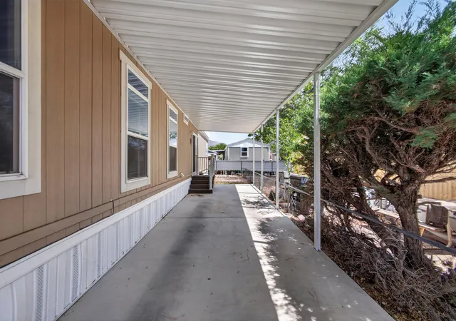 Photo 2 of Manufactured home for sale at 1014 Mustang Trl Se, Albuquerque, NM 87123 | MLS# 1109597 | Listing updated on 2026-09-16