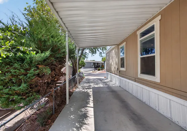 Photo 3 of Manufactured home for sale at 1014 Mustang Trl Se, Albuquerque, NM 87123 | MLS# 1109597 | Listing updated on 2026-09-16