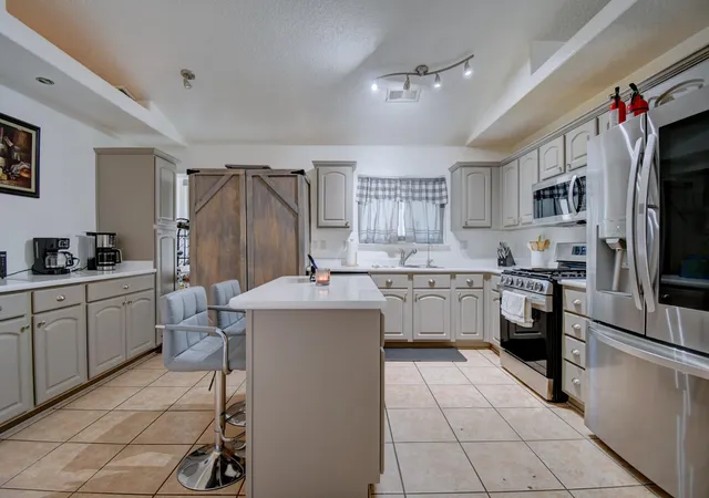 Photo 2 of Single family home for sale at 1319 Duskfire Dr Nw, Albuquerque, NM 87120 | MLS# 1109659 | Listing updated on 2026-09-08