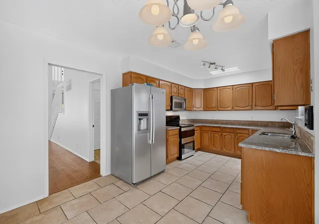 Photo 4 of Townhouse for sale at 10701 Malaguena Ln Ne, Albuquerque, NM 87111 | MLS# 1109929 | Listing updated on 2026-09-10