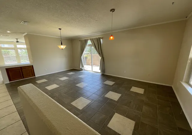 Photo 3 of Single family home for sale at 12400 Tularosa Trl Ne, Albuquerque, NM 87111 | MLS# 1110089 | Listing updated on 2026-09-17